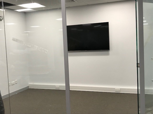 65″ commercial smart TV in meeting room